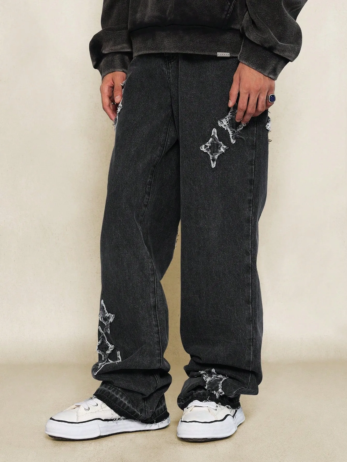 Flare Fit Washed Jean With All Over Distressed Detail