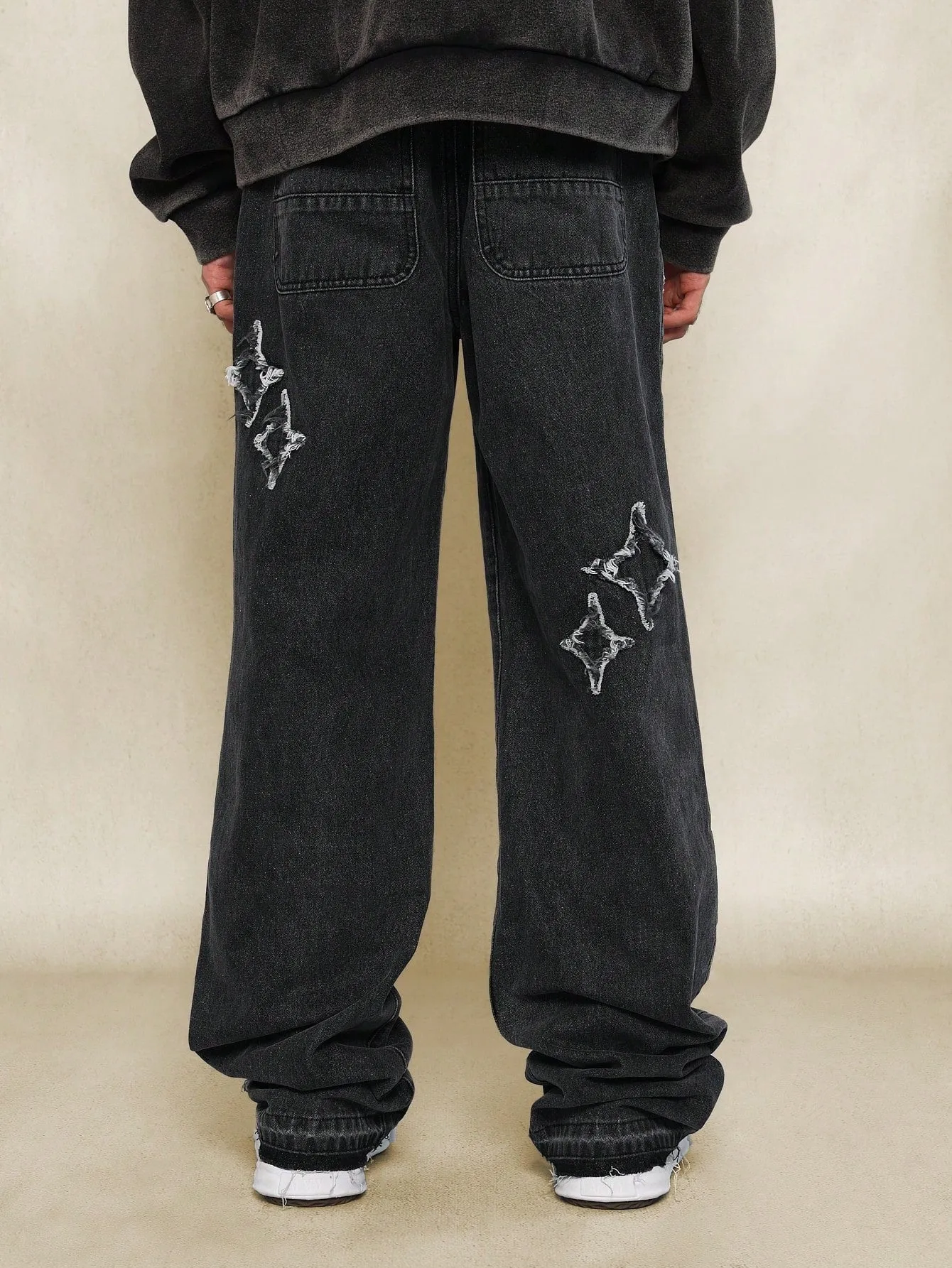 Flare Fit Washed Jean With All Over Distressed Detail